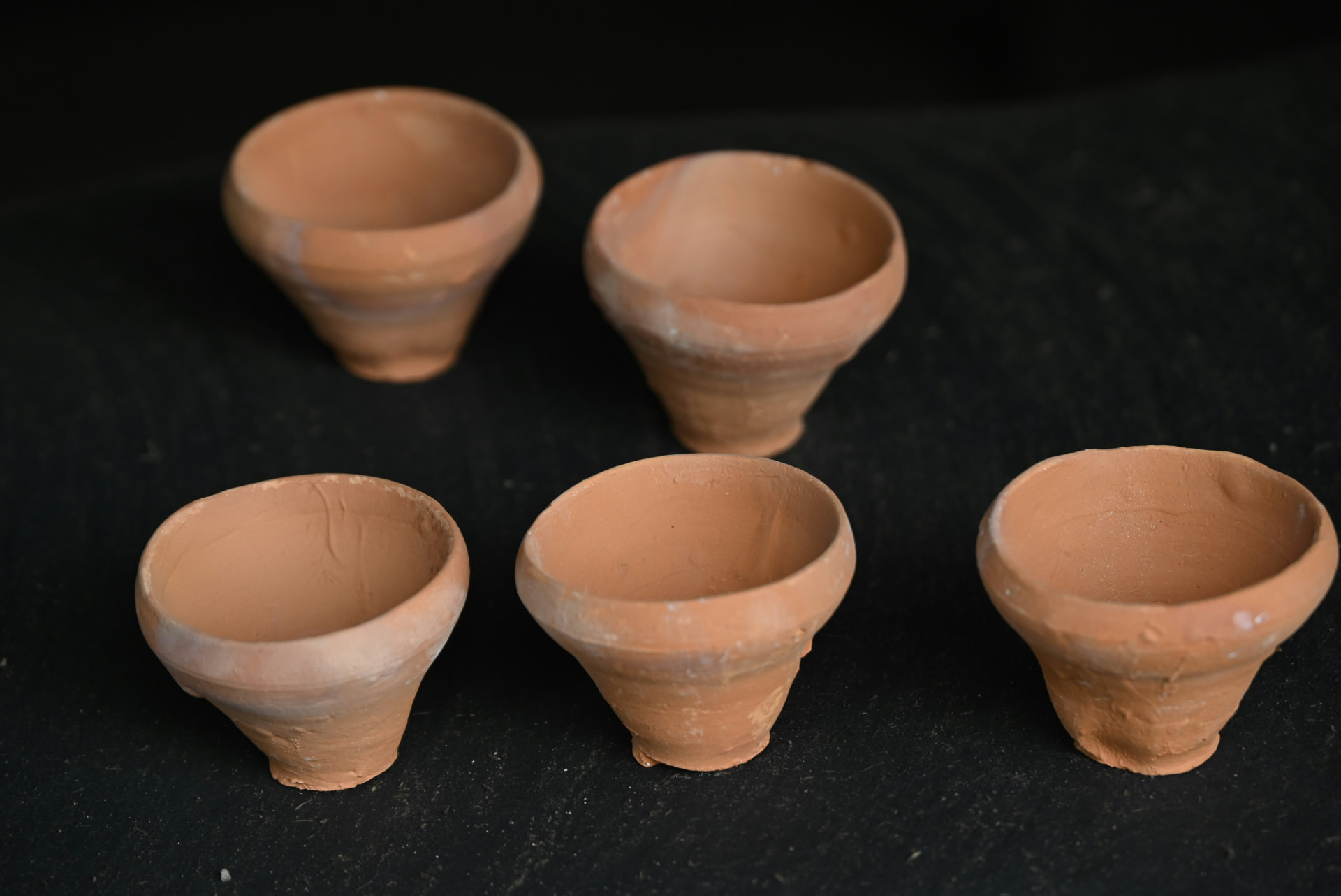 Handmade clay cup illustrating the Vedanta teaching of the cup and clay analogy